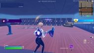 The last step of the glitch requires you to find an invisible button at top of the case (Image via Epic Games)